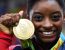 Simone Biles with her first Olympic Gold