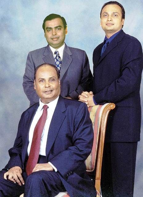 Dhirubhai Ambani (sitting) with his sons Mukesh (left) and Anil (right)