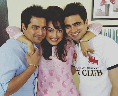 Karan Mehra with his wife and brother