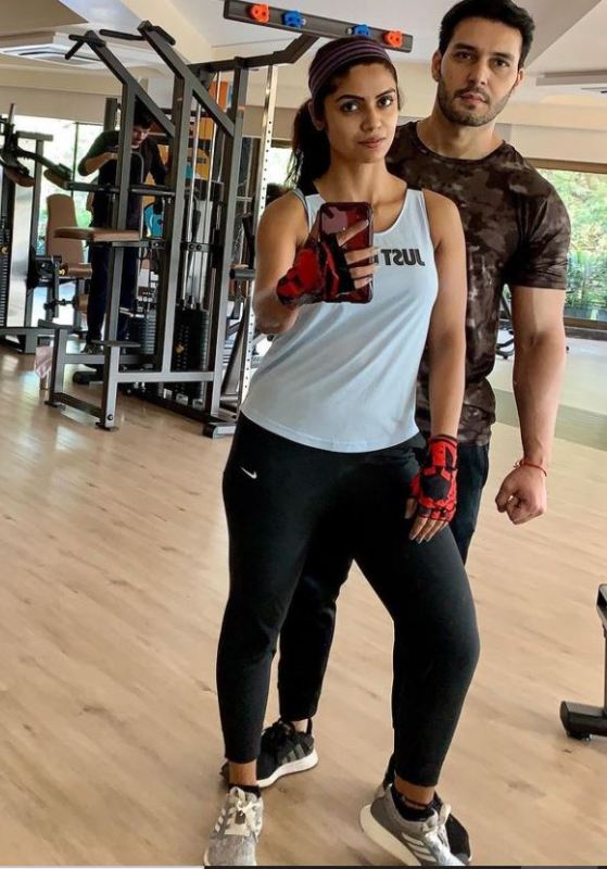 Sayantani Ghosh posing at a gym