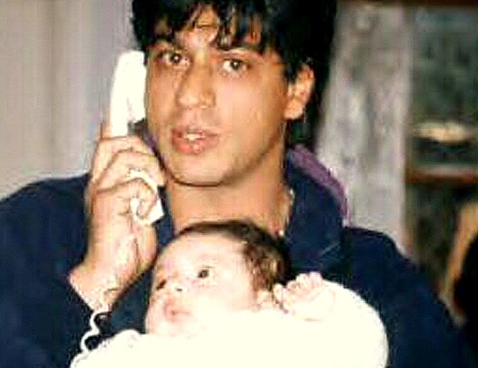 The Infant Aryan Khan in the lap of Shah Rukh Khan