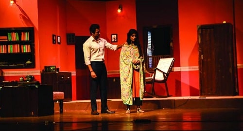 Rohit Roy performing in a theatre play