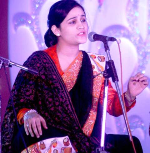 Aparna Yadav singing at an event