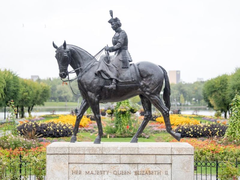 Bronze statue of Queen Elizabeth II riding her horse Burmese at Wascana Centre in Regina, Saskatchewan, Canada