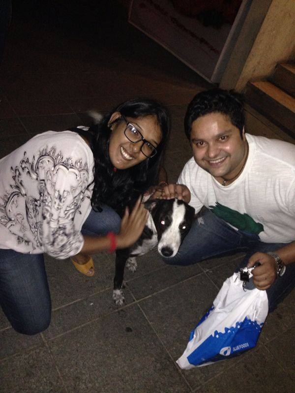 Kriti Mohan Playing With A Dog