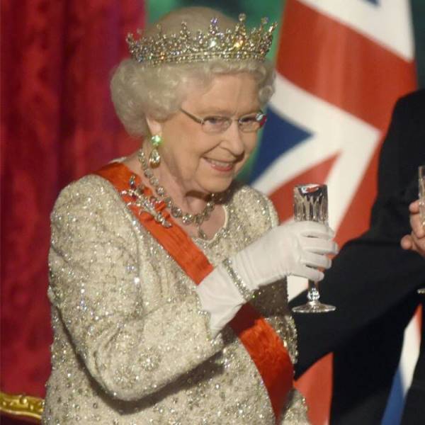 Queen Elizabeth II drinking alcohol at an event