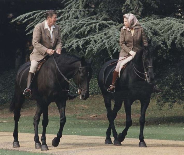 Queen Elizabeth II riding on her horse Burmese