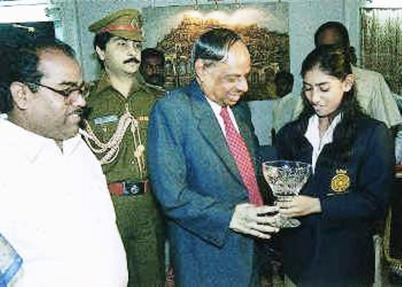 Mithali being congratulated by Governor, K. Rangarajan and Sports Minister P. Ramulu