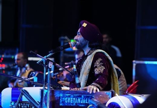 Satinder Sartaaj performing live at an event