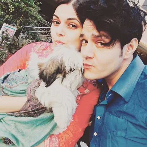 Aniruddh Dave with his wife and pet dog
