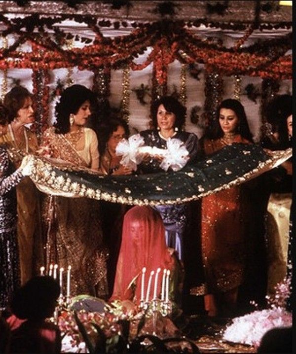 Benazir Bhutto (sitting) during her wedding ceremony in Lahore