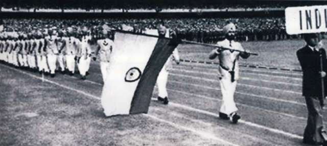 Balbir Singh with the Indian Flag