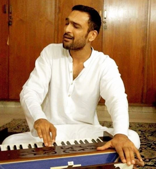 Ali Sethi playing harmonium
