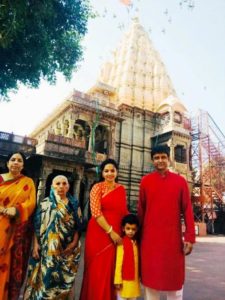 Shweta Jha with her family outside Mahakaleshwar Temple