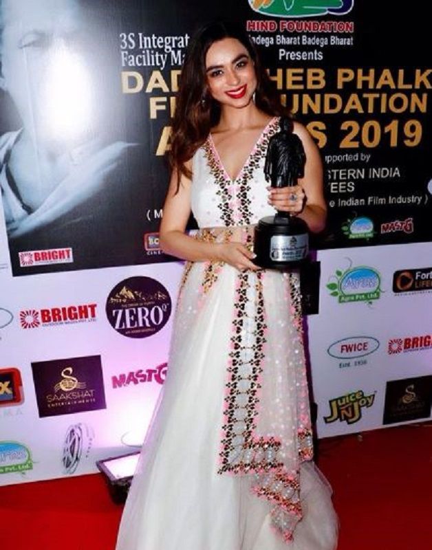 Soundarya Sharma Posing With Her Award
