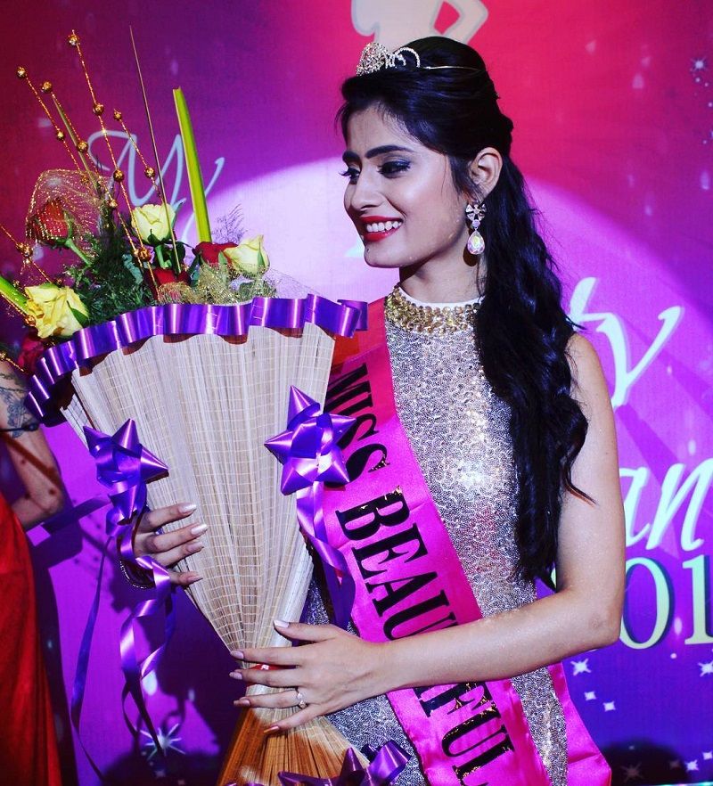 Vaishali Takkar wearing the 'Miss Most Beautiful' sashe at a beauty pageant