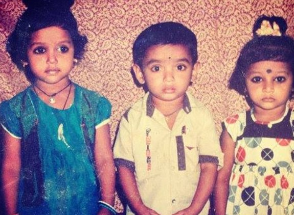 A childhood picture of Yashashri (left)