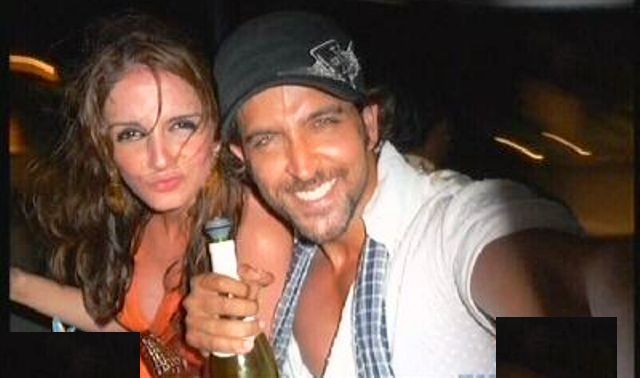 Hrithik Roshan posing with a bottle of tequila along with his ex-wife, Sussanne Khan