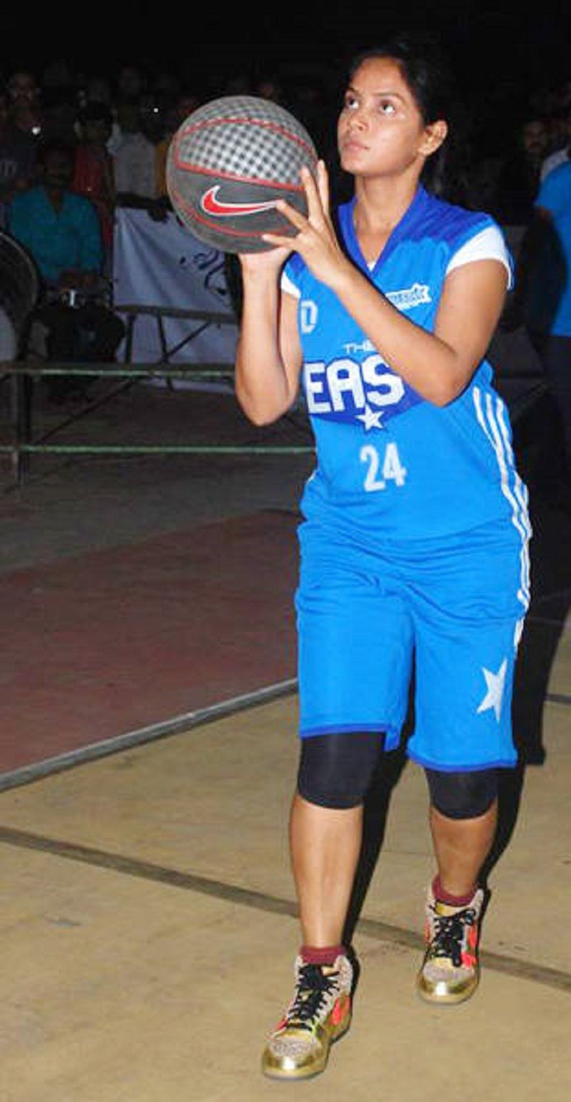 Neetu Chandra playing basketball