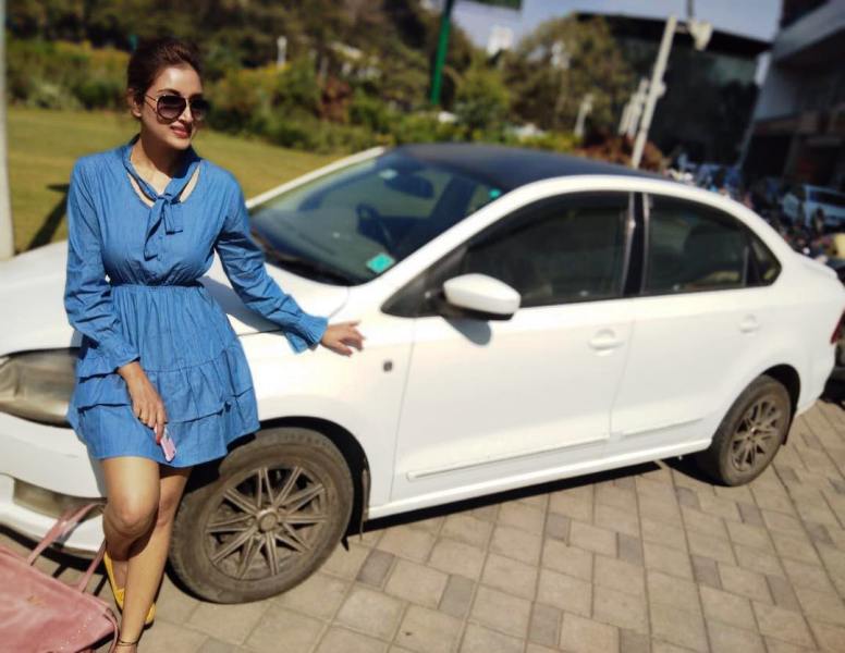 Rupali Bhosale Posing In Front Of Her Skoda Car