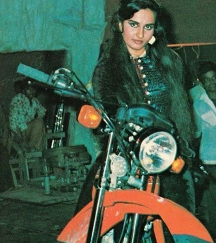 Reena Roy with a motorcycle
