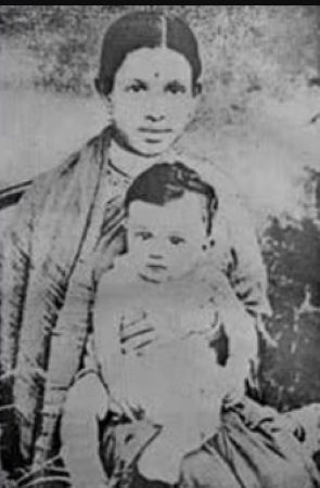 A childhood photo of Swami Vivekananda with his mother