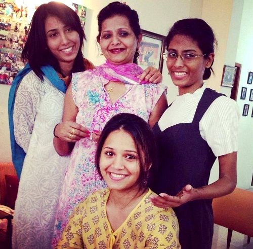 Dipika Pallikal with her mother and sisters