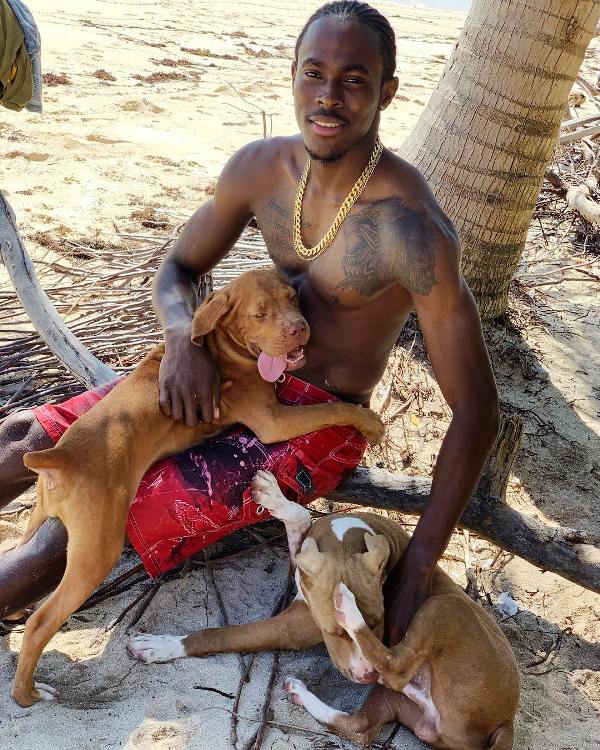 Jofra Archer Playing With His Pet Dogs