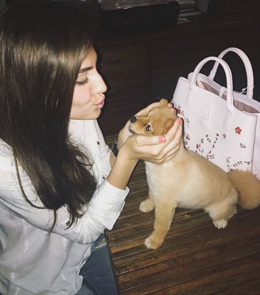 Elnaaz Norouzi with her pet dog