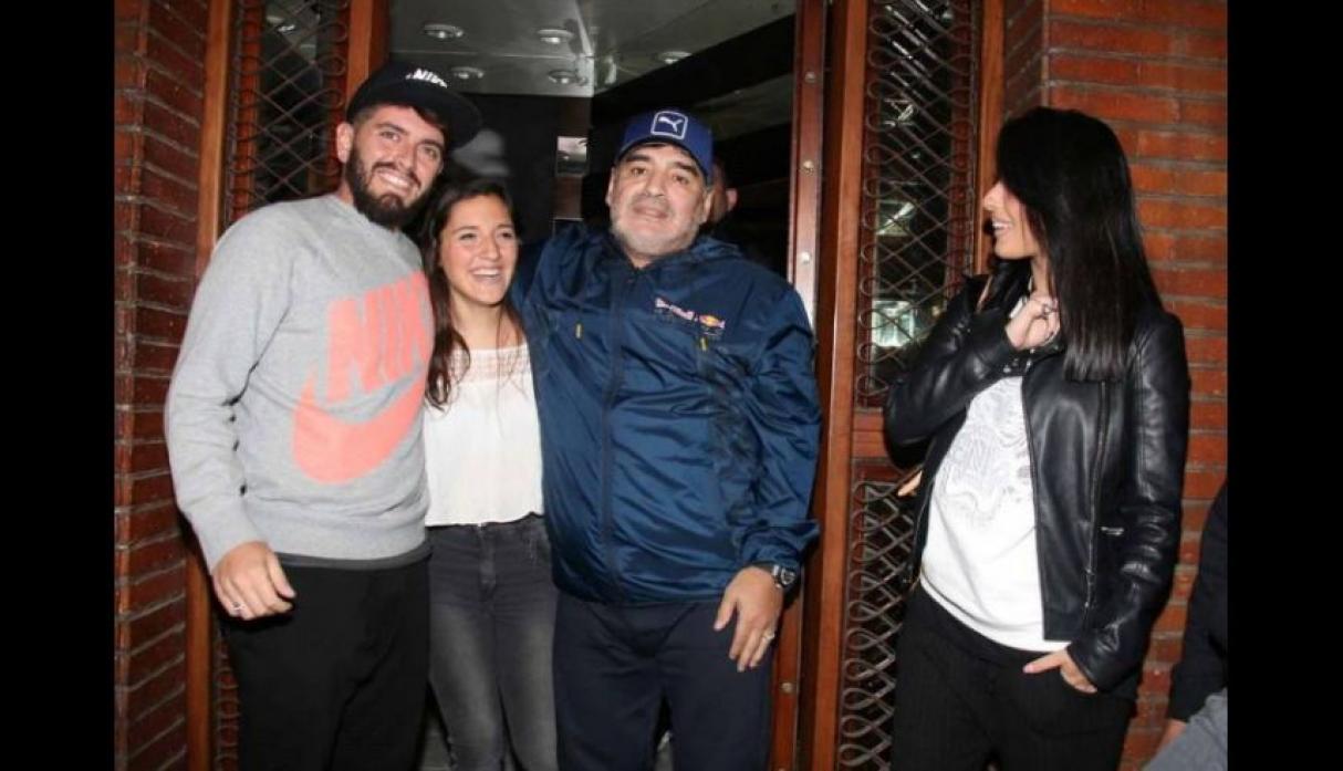 Diego Maradona with his two illegitimate children