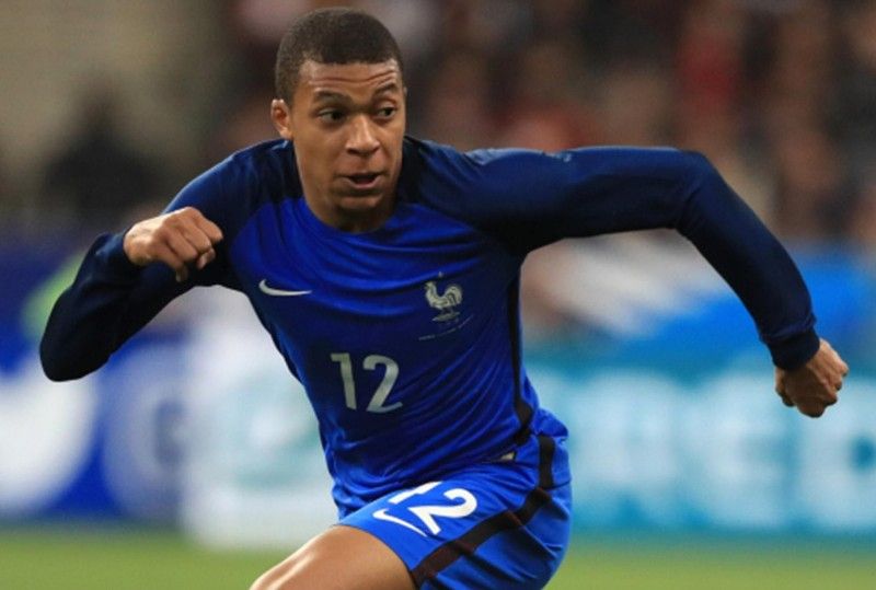 Kylian Mbappe during his debut for France