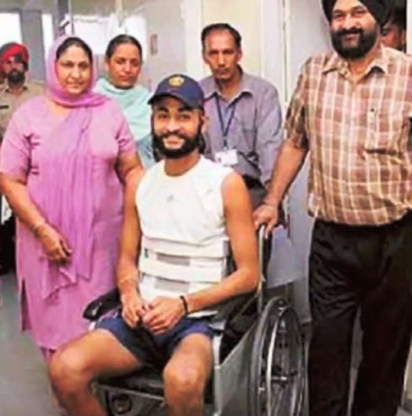 Sandeep Singh on a Wheelchair