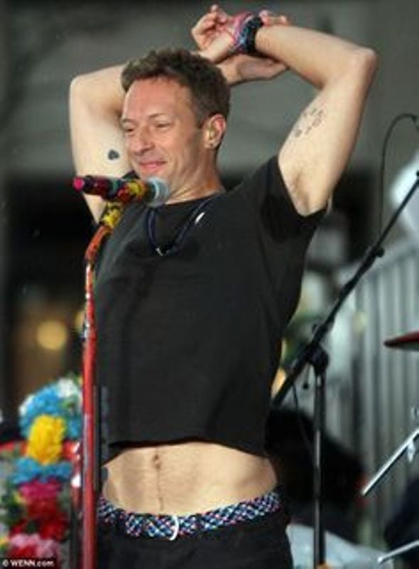 Does anyone know what Chris Martins left arm tattoo says  rColdplay