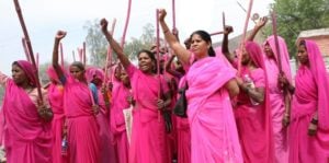 Sampat Pal’s Gulaabi Gang in Pink Sarees and with Pink Sticks