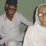 Vashishtha Narayan Singh with his mother