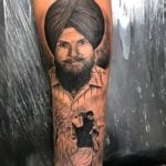 Karan Aujla right arm tattoo