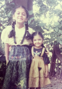Bhoomi Trivedi with her sister in her childhood