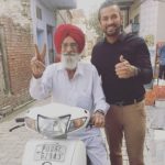 Garry Sandhu with his father