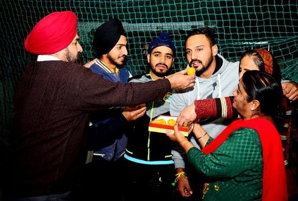 Anmolpreet Singh celebrating with his family after picked by Mumbai Indians for the 2019 IPL auction