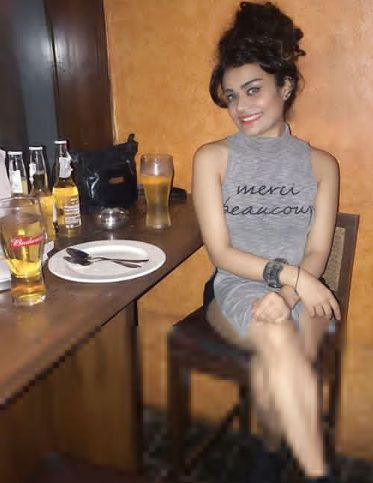 Rashi Raga with a glass of beer