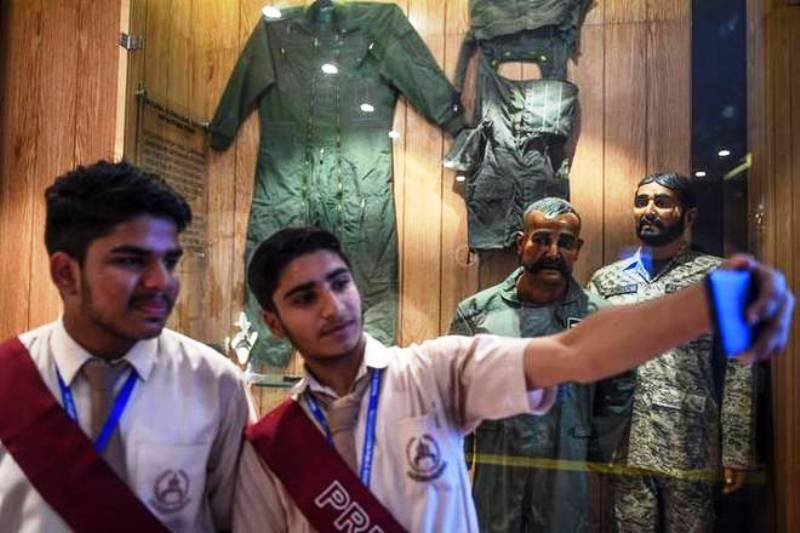 Students taking selfie with the mannequin of Abhinandan Varthaman in Pakistan
