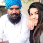 Kaur B with her father
