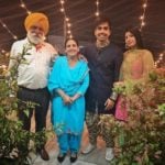 Hardy Sandhu with his parents and girlfriend