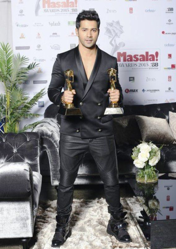 Varun Dhawan Posing With His Awards