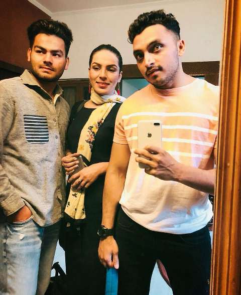Amber Zaidi with her brothers