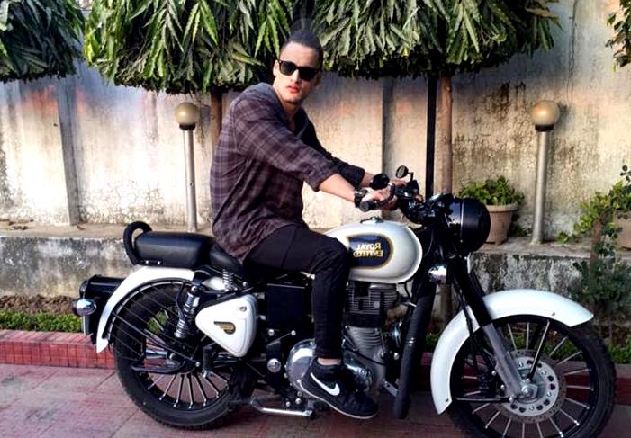Asim Riaz on his motorcycle