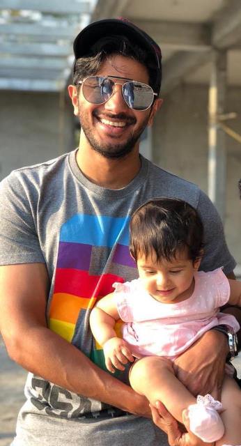 Dulquer Salmaan with his daughter