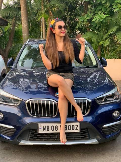 Koushani Mukherjee with her car