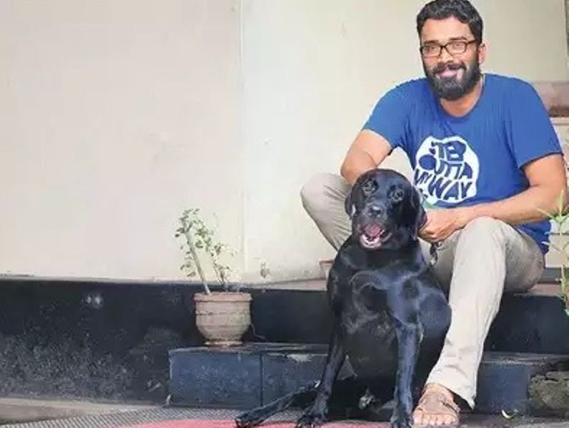 Sriram Venkitaraman with his dog Ray