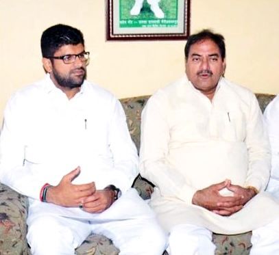 Dushyant Chautala with his father Ajay Singh Chautala